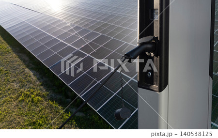 Electric vehicles charging station that takes energy from solar panels. Close up. 140538125