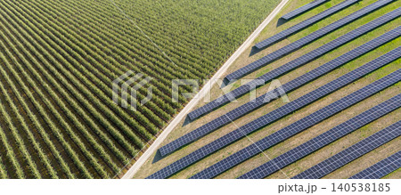 Aerial view of solar power station and fruit orchard. Sustainable development Aerial view of solar power station and fruit orchard. Sustainable development 140538185