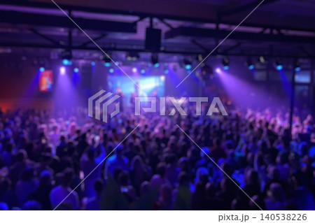 Blurred out-of-focus crowded live concert inside a club Blurred out-of-focus crowded live concert inside a club 140538226