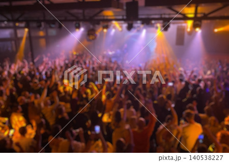 Blurred out-of-focus crowded live concert inside a club Blurred out-of-focus crowded live concert inside a club 140538227