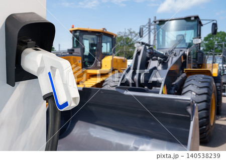 Electric construction machines with charging station. Concept. Electric construction machines with charging station. Concept. 140538239