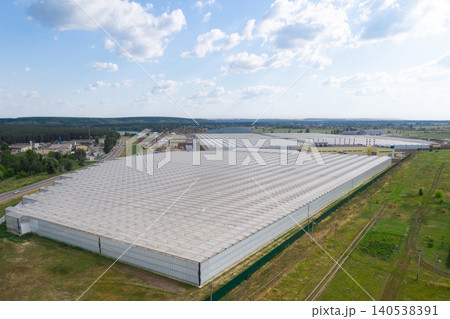 Industrial agricultural greenhouses for growing vegetables. Aerial view. Industrial agricultural greenhouses for growing vegetables. Aerial view. 140538391