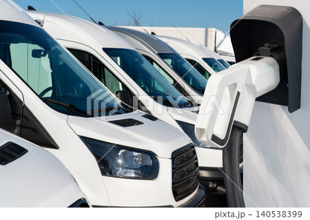 Electric delivery vans with electric vehicles charging station. Electric delivery vans with electric vehicles charging station. 140538399