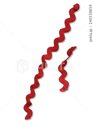 This is a red ribbon in a wave shape. 140538654