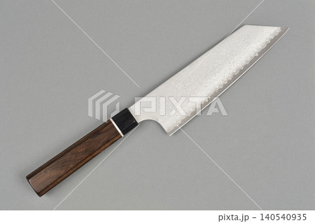 Japanese damascus steel kitchen knife on gray background 140540935