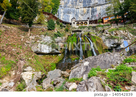 St. Beatus Waterfall at St. Beatus Caves entrance in Beatenberg, Bernese Oberland, Switzerland St. Beatus Waterfall at St. Beatus Caves entrance in Beatenberg, Bernese Oberland, Switzerland 140542839