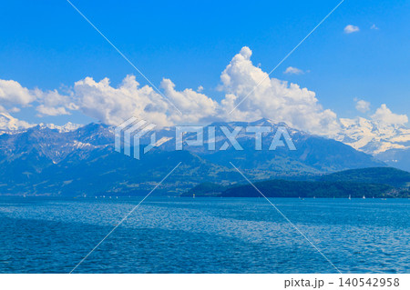 View of the Annecy lake surrounded by beautiful mountains in Annecy, France 140542958