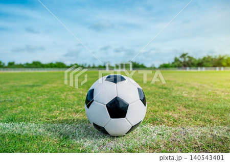 Soccer Ball on White Line Facing Goalpost Concept of Target, Vision, and Business Success Soccer Ball on White Line Facing Goalpost Concept of Target, Vision, and Business Success 140543401