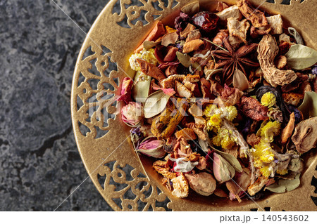 Mixture of dried medicinal herbs, flowers and roots. Mixture of dried medicinal herbs, flowers and roots. 140543602