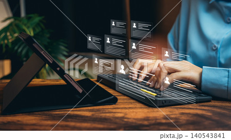 Customer data concept. Hands typing on keyboard with virtual profile cards, CRM system, user database management, digital identity, information security, business analytics, smart organization. Customer data concept. Hands typing on keyboard with virtual profile cards, CRM system, user database management, digital identity, information security, business analytics, smart organization. 140543841