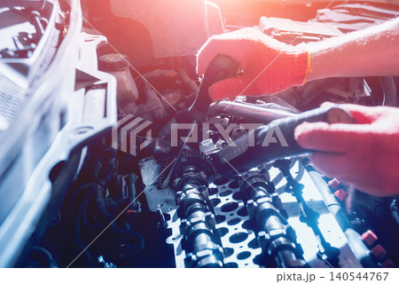 Repairing engine at service station. Car repair. Background Repairing engine at service station. Car repair. Background 140544767