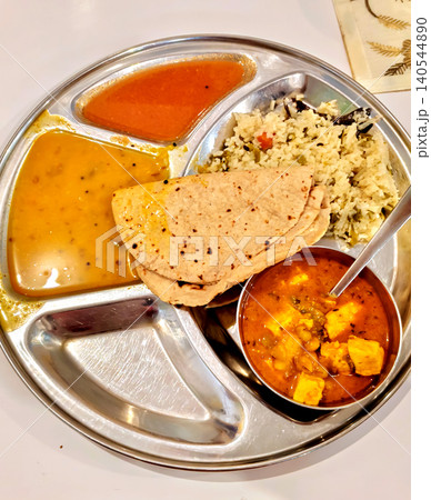 Traditional Indian Thali with Dal, Rice, and Roti 140544890