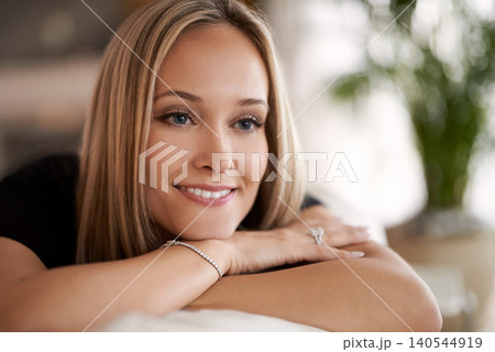 Thinking, face and woman relax in a house with idea inspiration, insight or inner peace. Planning, face and female person in a living room remember happy memory, reflection or gratitude in her home Thinking, face and woman relax in a house with idea inspiration, insight or inner peace. Planning, face and female person in a living room remember happy memory, reflection or gratitude in her home 140544919