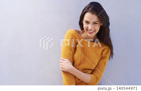 Woman, smile and mockup with fashion, laugh and smile with sweater for comfort. Model, happy and positive with natural, fun and confidence for funny joke or cool isolated on white wall background Woman, smile and mockup with fashion, laugh and smile with sweater for comfort. Model, happy and positive with natural, fun and confidence for funny joke or cool isolated on white wall background 140544971