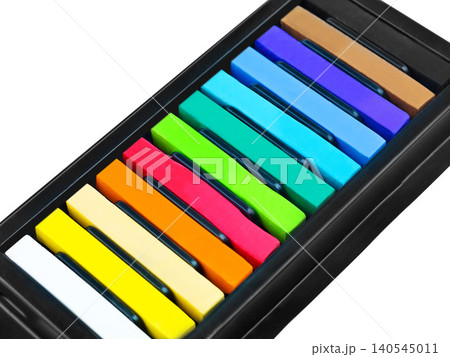 Artist, pastel and color sticks in studio for rainbow or vibrant creativity, texture and pigments for fine or visual arts. Oil or watercolor paint, chalk or palette to shade or blend with composition Artist, pastel and color sticks in studio for rainbow or vibrant creativity, texture and pigments for fine or visual arts. Oil or watercolor paint, chalk or palette to shade or blend with composition 140545011