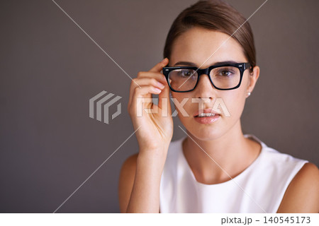 Portrait, business and glasses with woman, optometry and employee on a studio background. Face, person and model with stylish eyewear or clear vision with mockup space and frame with sight or agent Portrait, business and glasses with woman, optometry and employee on a studio background. Face, person and model with stylish eyewear or clear vision with mockup space and frame with sight or agent 140545173