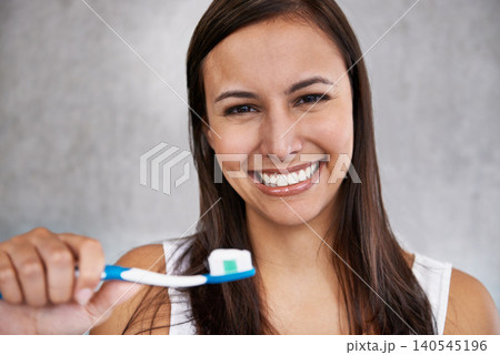 Happy, woman and portrait with toothbrush in morning, routine and grooming with self care in home. Clean, teeth and girl with healthy smile from whitening, dental toothpaste and brushing in bathroom Happy, woman and portrait with toothbrush in morning, routine and grooming with self care in home. Clean, teeth and girl with healthy smile from whitening, dental toothpaste and brushing in bathroom 140545196