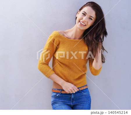 Portrait, fashion and smile of woman on a wall, model or funny girl laughing isolated on a white background mockup space. Happy, trendy an person in casual clothes, jeans or stylish sweater in Italy 140545214