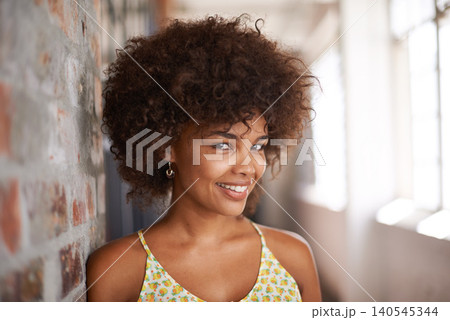 Portrait, happy and woman by brick wall at university for education, learning or confidence in corridor alone. Face, student and young girl in hallway of college for profile picture in South Africa Portrait, happy and woman by brick wall at university for education, learning or confidence in corridor alone. Face, student and young girl in hallway of college for profile picture in South Africa 140545344