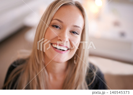 Happy, portrait and woman in a house relax with confidence, positive attitude or feel good mood in her home. Face, smile and female person in a living room with vacation, free time or resting holiday Happy, portrait and woman in a house relax with confidence, positive attitude or feel good mood in her home. Face, smile and female person in a living room with vacation, free time or resting holiday 140545373