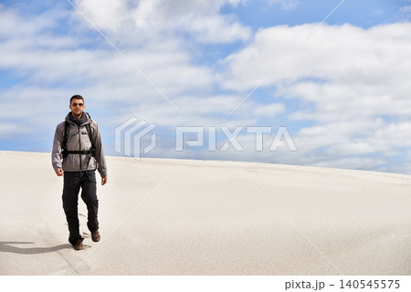 Travel, backpack or fitness man in desert for adventure, journey or resort, location and exploration. Freedom, holiday or male backpacker in Egypt for sand dunes walking, wellness or hiking in nature Travel, backpack or fitness man in desert for adventure, journey or resort, location and exploration. Freedom, holiday or male backpacker in Egypt for sand dunes walking, wellness or hiking in nature 140545575