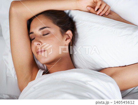 Pillow, relax and woman sleeping on bed, bedroom and peace on mattress, soft and comfortable. Home, tired and female person rest for fatigue, health and break for weekend in house with cozy duvet Pillow, relax and woman sleeping on bed, bedroom and peace on mattress, soft and comfortable. Home, tired and female person rest for fatigue, health and break for weekend in house with cozy duvet 140545612