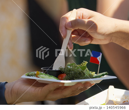 Eating Philippine Sea Grapes Salad Lato at Embassy Street Festival in Prague Eating Philippine Sea Grapes Salad Lato at Embassy Street Festival in Prague 140545966