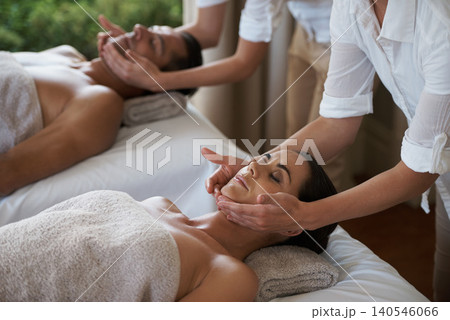 Vacation, facial massage and couple relax in spa for care of body with rest on table of retreat for honeymoon. Hotel, man and woman together in resort for health, wellness and holiday for skincare 140546066