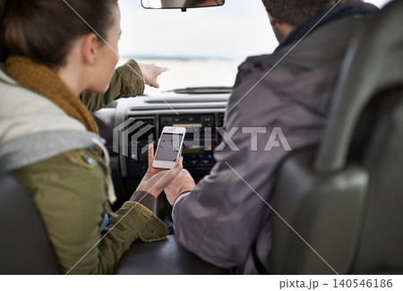 Road trip, couple and smartphone for navigation in car, adventure and connectivity for travel exploration in nature. People, mobile app and bonding together on holiday, journey and honeymoon in oman 140546186