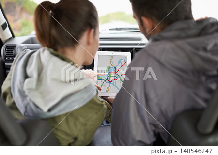 Couple, car and gps on road trip with map for direction, vacation and travel to destination in countryside. Woman, man and tablet in vehicle for navigation and location to holiday journey and tourism 140546247