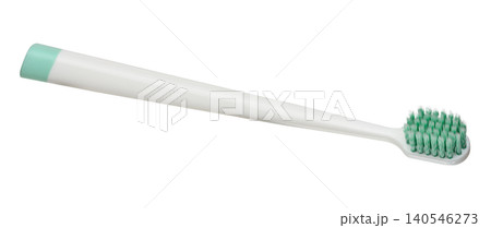 White plastic toothbrush with turquoise insert on the handle and thick green bristles 140546273