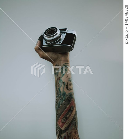 photographer taking photo with camera photographer taking photo with camera 140546329