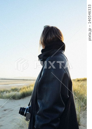 woman with camera woman with camera 140546333