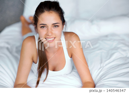 Portrait, bed and relax with woman, vacation and bedroom with happiness and casual with comfort. Face, person and apartment with girl and home with hospitality and weekend break with smile or morning Portrait, bed and relax with woman, vacation and bedroom with happiness and casual with comfort. Face, person and apartment with girl and home with hospitality and weekend break with smile or morning 140546347