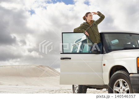 Car, road trip and woman in a desert for location, search or holiday, adventure and exploration. Travel, stop and female person with vehicle in Egypt for sand dunes journey, nature or waiting outdoor Car, road trip and woman in a desert for location, search or holiday, adventure and exploration. Travel, stop and female person with vehicle in Egypt for sand dunes journey, nature or waiting outdoor 140546357