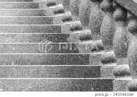 Granite steps ascend beside a carved balustrade, captured in black-and-white 140546386