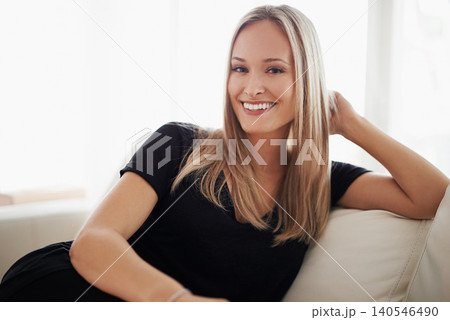 Portrait, smile and woman on a sofa relax with confidence, positive attitude or feel good mood in her home. Face, happy and female person in a living room with vacation, free time or resting holiday Portrait, smile and woman on a sofa relax with confidence, positive attitude or feel good mood in her home. Face, happy and female person in a living room with vacation, free time or resting holiday 140546490