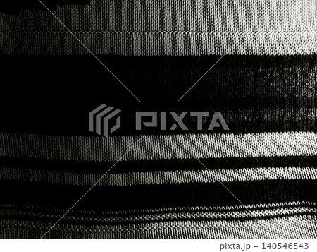 bold horizontal stripes accentuate textured monochrome knitted fabric with intricate ribbed weave in dramatic macro bold horizontal stripes accentuate textured monochrome knitted fabric with intricate ribbed weave in dramatic macro 140546543