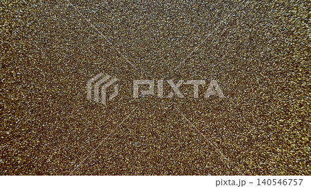 sparkling golden glitter texture with a shimmering bronze gradient creating a celebratory and festive abstract background sparkling golden glitter texture with a shimmering bronze gradient creating a celebratory and festive abstract background 140546757