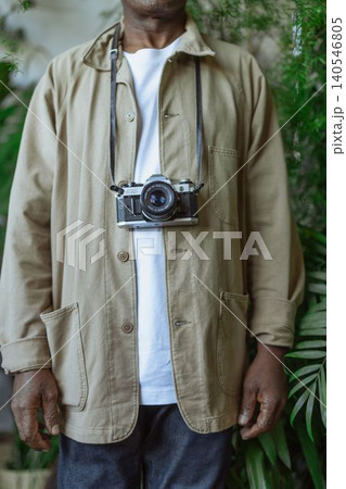 close up of man with vintage camera close up of man with vintage camera 140546805