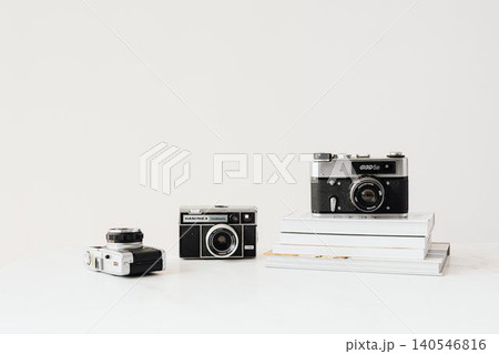 old camera and vintage camera on white background 140546816