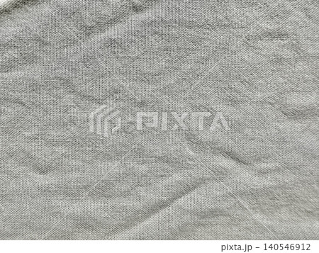 textured grey linen fabric background reveals natural woven cotton canvas fiber with soft organic creases textured grey linen fabric background reveals natural woven cotton canvas fiber with soft organic creases 140546912