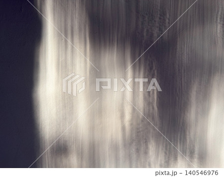 architectural shadow play cascades across textured stucco wall creating moody minimalist abstract background architectural shadow play cascades across textured stucco wall creating moody minimalist abstract background 140546976