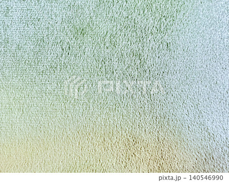 textured mint suede fabric creates tactile gradient background with velvety moss green nap and soft morning light glow textured mint suede fabric creates tactile gradient background with velvety moss green nap and soft morning light glow 140546990