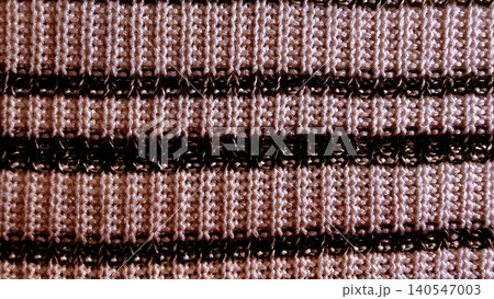 organic textured knit fabric showcases intricate weave patterns and cozy brown striped accents in a warm serene macro organic textured knit fabric showcases intricate weave patterns and cozy brown striped accents in a warm serene macro 140547003