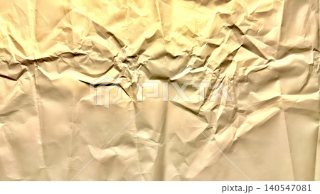 crumpled beige paper texture exposes intensely chaotic folds deep creases and warm abstract shadows crumpled beige paper texture exposes intensely chaotic folds deep creases and warm abstract shadows 140547081