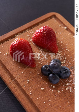 dessert with blueberries and raspberries dessert with blueberries and raspberries 140547237