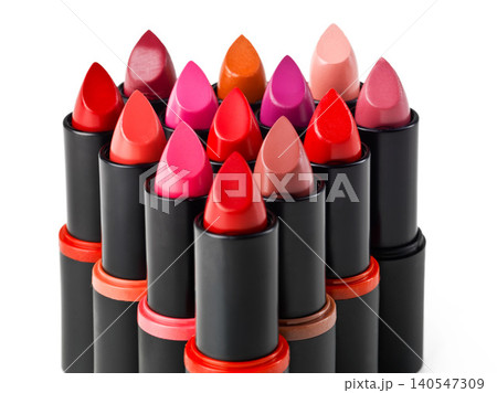 Lipstick, makeup and product in studio for cosmetics, beauty and luxury colors on white background. Closeup, aesthetic and dermatology for lip grooming, choice and group for selection in promo or ads Lipstick, makeup and product in studio for cosmetics, beauty and luxury colors on white background. Closeup, aesthetic and dermatology for lip grooming, choice and group for selection in promo or ads 140547309