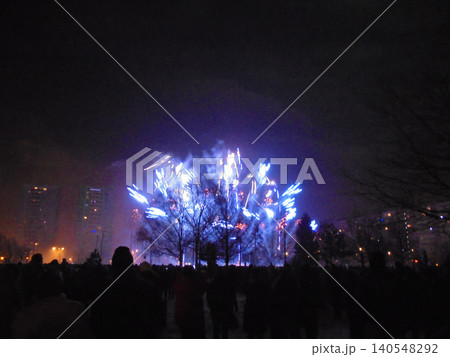 Magnificent burst of blue flash light fireworks during New Year pyro show. 140548292