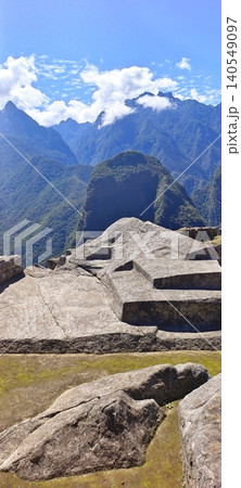 Sacred carved Inca stone against the backdrop of the Andes mountains Sacred carved Inca stone against the backdrop of the Andes mountains 140549097